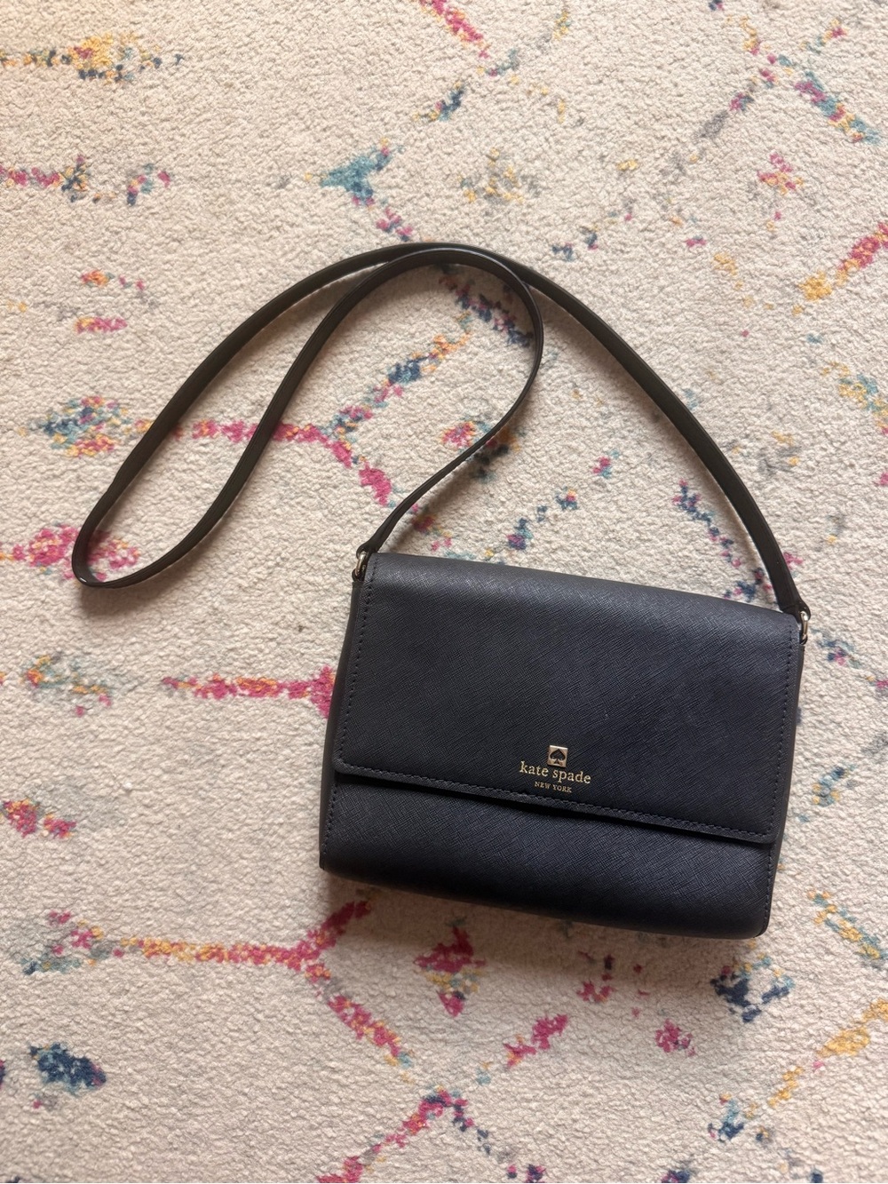 kate spade black leather crossbody bag with gold logo